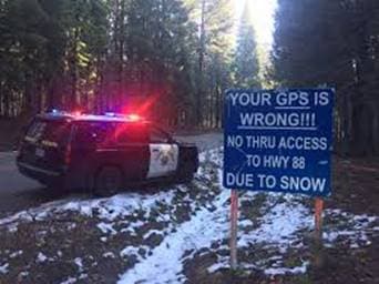 AA road sign on Highway 88 referencing the fact that road closures on 88 aren't included in the information navigation apps provide currently.