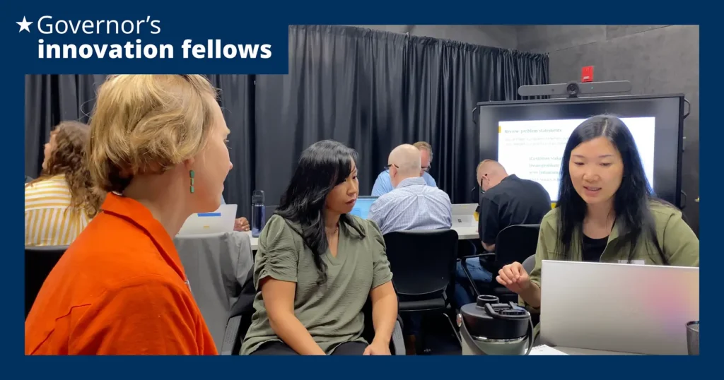 State employees talking through problems at tables